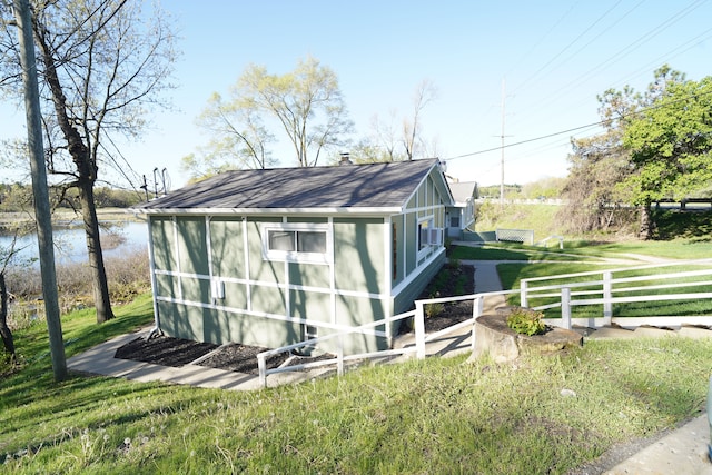 1298 E Highland Rd, Highland, MI 48356 - view of outdoor structure featuring a water view