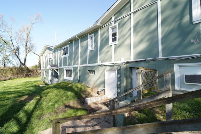 1298 E Highland Rd, Highland, MI 48356 - view of side of home with a yard