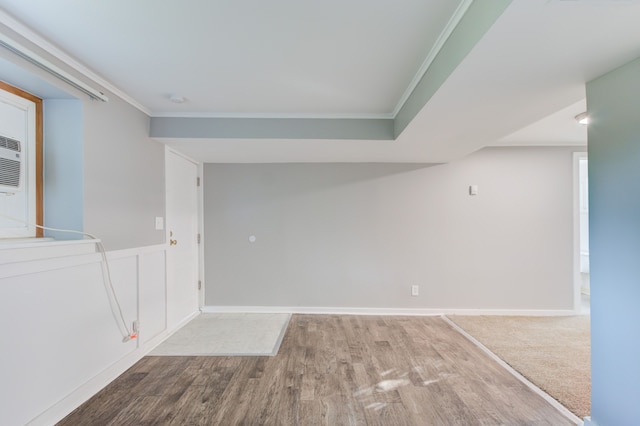1298 E Highland Rd, Highland, MI 48356 - spare room with wood finished floors, crown molding, and baseboards