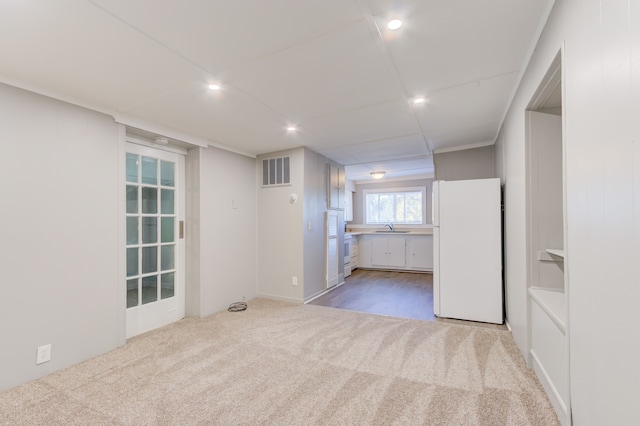 1298 E Highland Rd, Highland, MI 48356 - spare room featuring carpet, a sink, and recessed lighting