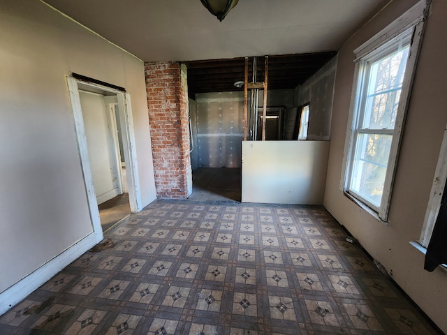 spare room featuring a wealth of natural light