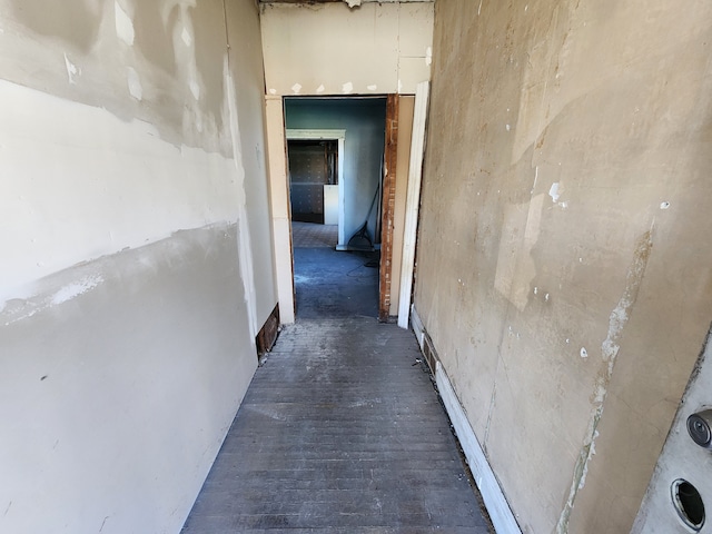 corridor with wood finished floors
