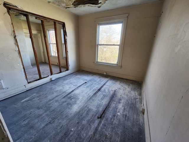 unfurnished room featuring wood finished floors