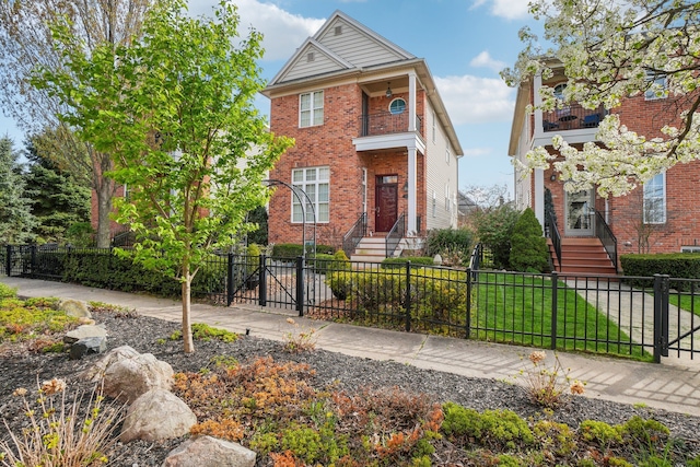 29044 Thistle Ln, Harrison Township, MI 48045 - view of front of property featuring a fenced front yard, brick siding, and a balcony