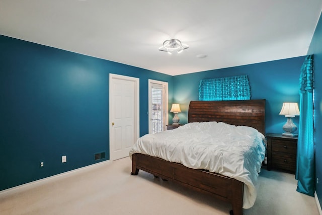 29044 Thistle Ln, Harrison Township, MI 48045 - bedroom with carpet flooring, baseboards, and visible vents