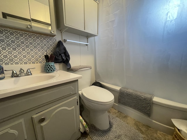 bathroom featuring vanity, shower / bath combo, toilet, and visible vents