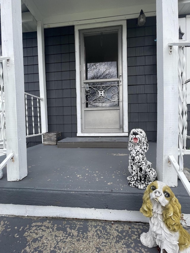 entrance to property with a porch