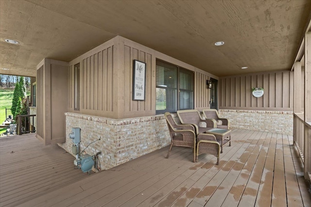 wooden deck featuring covered porch