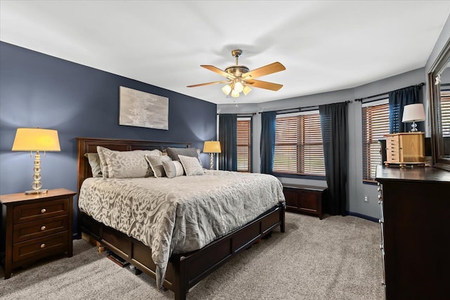 bedroom with baseboards, a ceiling fan, and carpet flooring