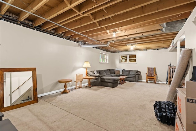 living room with carpet floors and baseboards