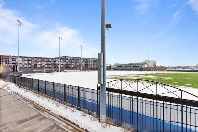 view of community featuring fence