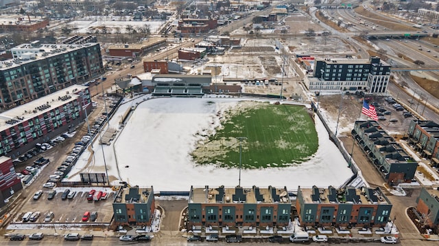 birds eye view of property featuring a city view