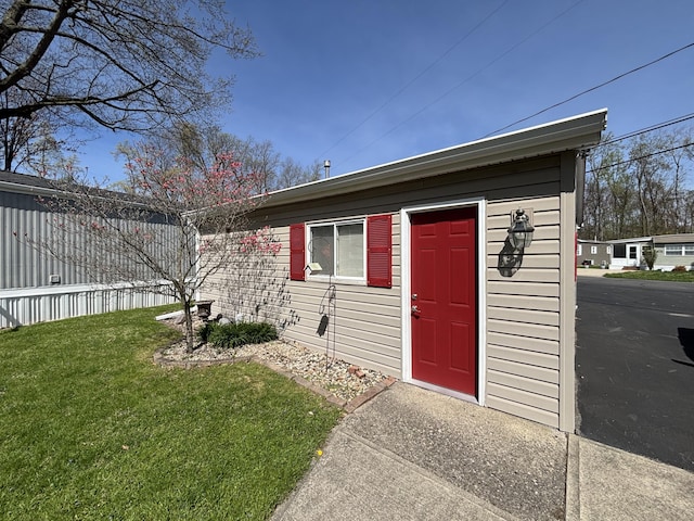 exterior space with a yard