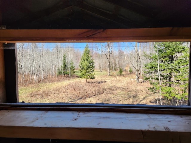1837 9 Mile Rd, Sears, MI 49679 - detailed view of a heavily wooded area