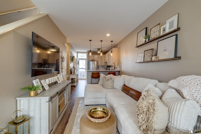 living room with recessed lighting, ceiling fan, and wood finished floors