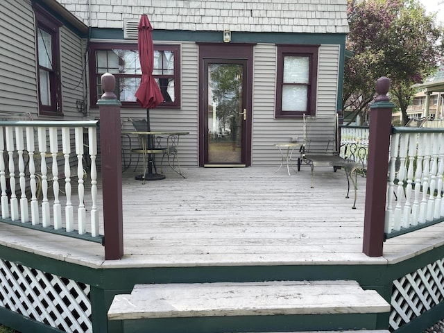 deck featuring outdoor dining space