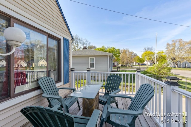wooden deck featuring a porch