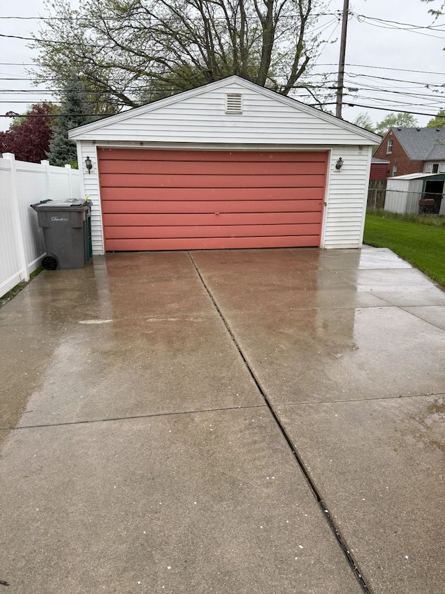 detached garage with fence