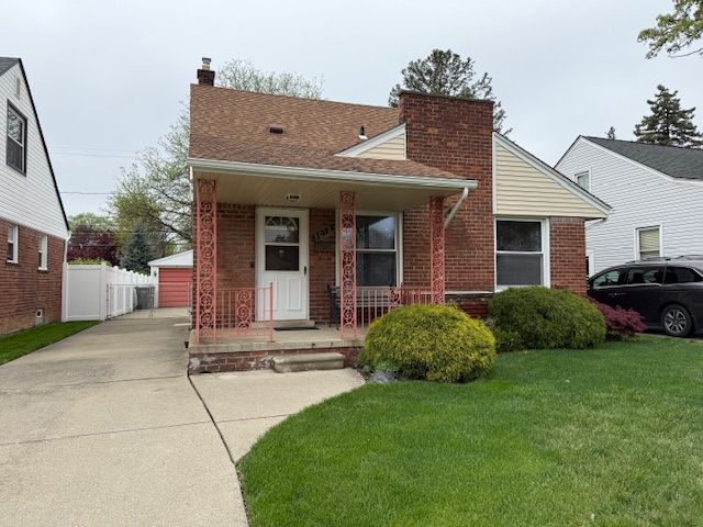 bungalow-style house featuring covered porch, brick siding, and a chimney