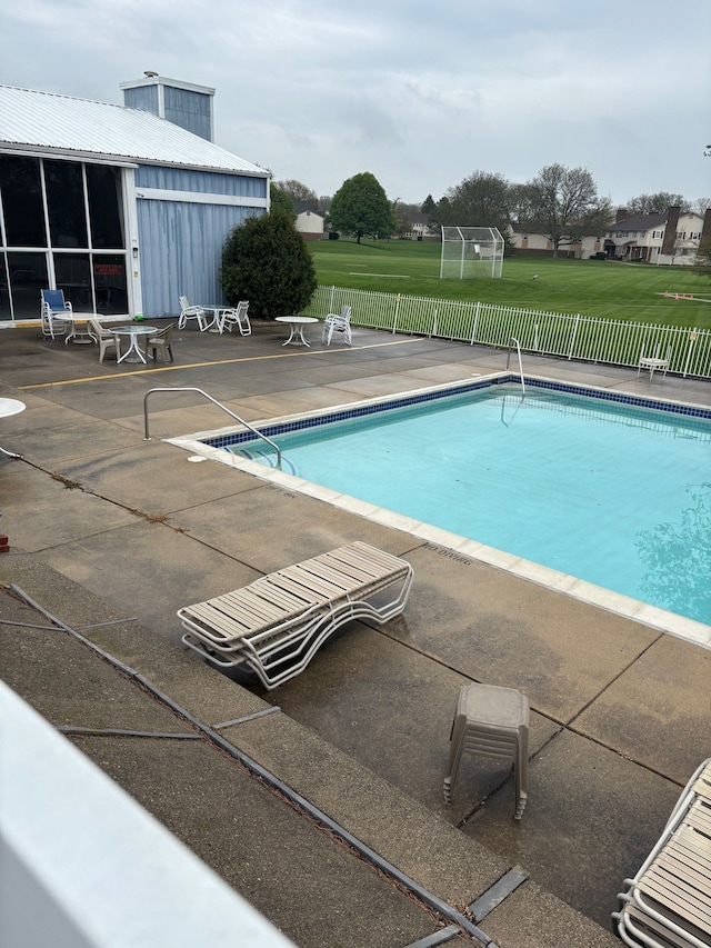 41781 Onaway Dr, Northville, MI 48167 - view of pool with a fenced in pool, fence, and a patio area