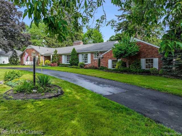 830 Jonathan Ln, Bloomfield Hills, MI 48302 - ranch-style home featuring a front yard, brick siding, driveway, and a chimney