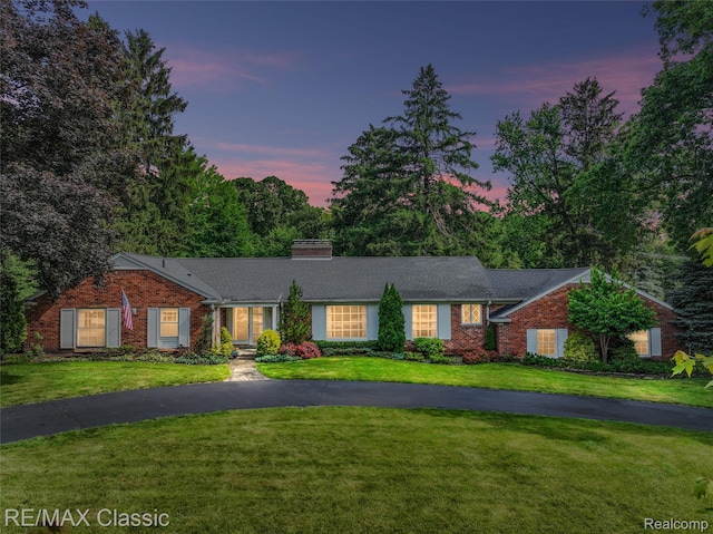 830 Jonathan Ln, Bloomfield Hills, MI 48302 - ranch-style home featuring a front lawn, a chimney, brick siding, and driveway