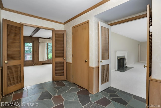 830 Jonathan Ln, Bloomfield Hills, MI 48302 - corridor featuring dark stone finish floors, dark colored carpet, and crown molding