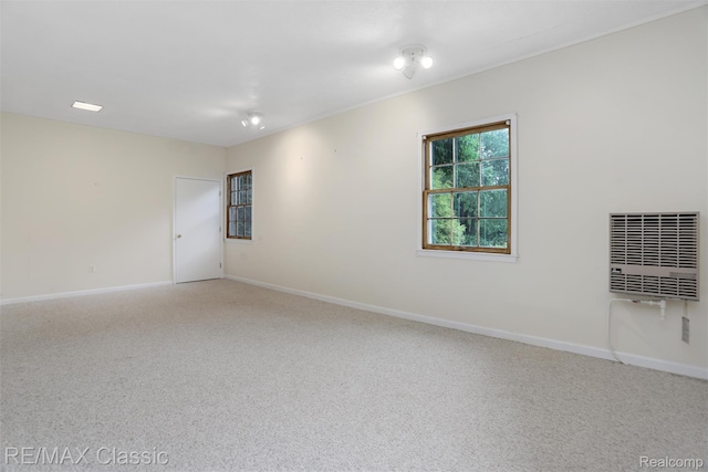 830 Jonathan Ln, Bloomfield Hills, MI 48302 - spare room featuring heating unit and carpet
