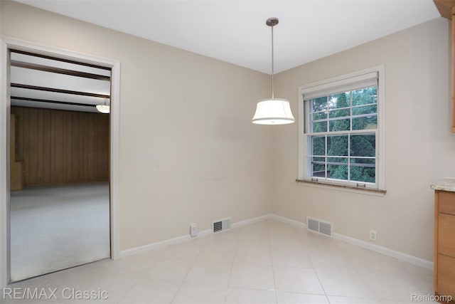 830 Jonathan Ln, Bloomfield Hills, MI 48302 - unfurnished dining area with baseboards and light tile patterned floors
