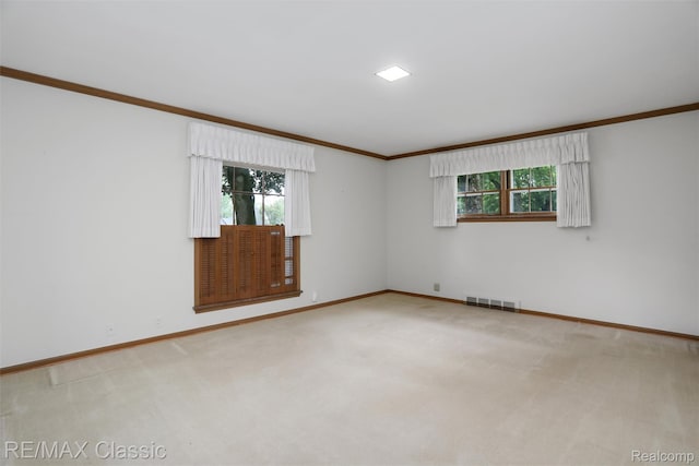 830 Jonathan Ln, Bloomfield Hills, MI 48302 - unfurnished room featuring crown molding, carpet flooring, and plenty of natural light