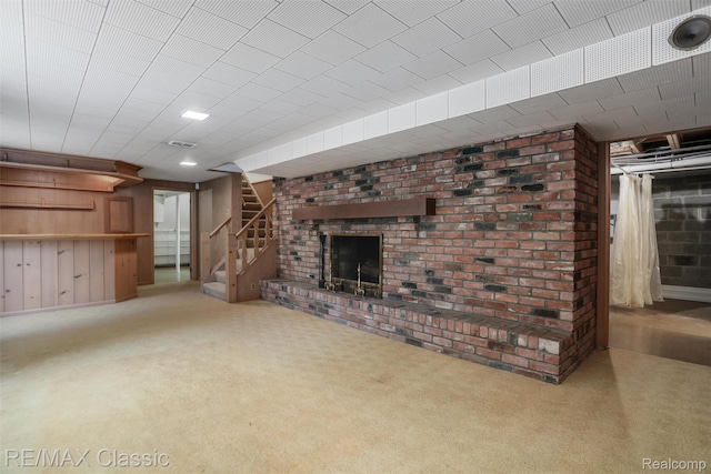 830 Jonathan Ln, Bloomfield Hills, MI 48302 - unfurnished living room featuring stairs, a brick fireplace, and carpet floors