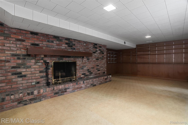 830 Jonathan Ln, Bloomfield Hills, MI 48302 - unfurnished living room with carpet, a fireplace, and wood walls