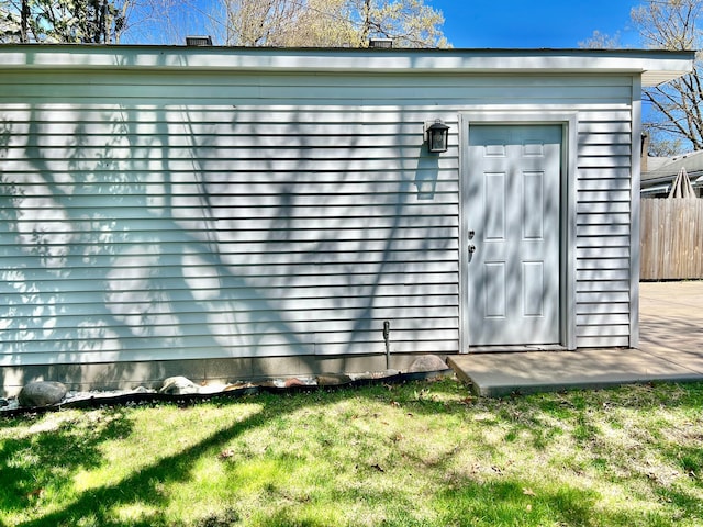 view of shed with fence