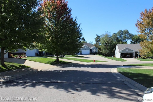 view of road featuring sidewalks and curbs