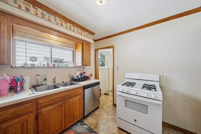kitchen featuring stainless steel dishwasher, ornamental molding, white range with gas stovetop, light countertops, and a sink