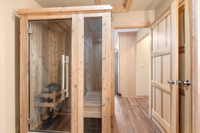 view of sauna with wood finished floors