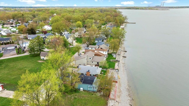 bird's eye view featuring a residential view and a water view
