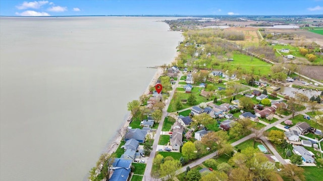 aerial view featuring a water view and a residential view