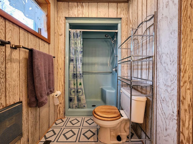 W11635 Lake St, Naubinway, MI 49762 - bathroom featuring toilet, tile patterned floors, and a stall shower