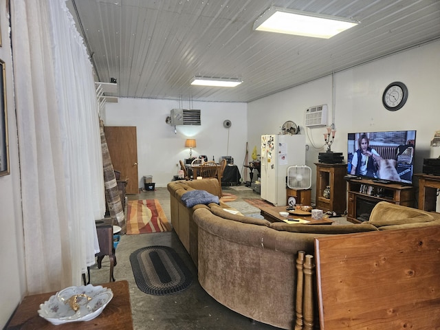 living area featuring a wall mounted AC