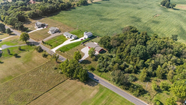 birds eye view of property featuring a rural view