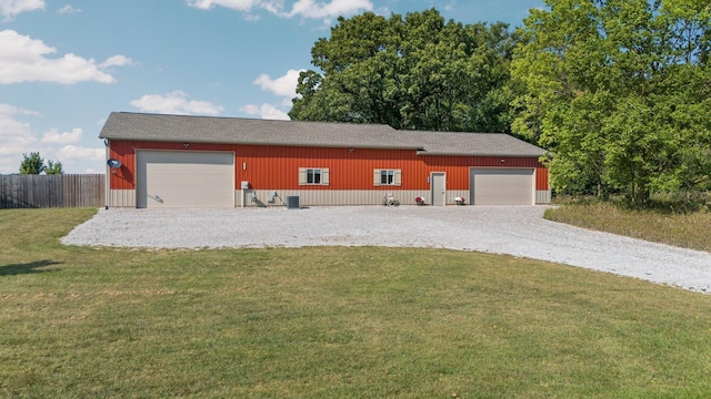 garage featuring fence