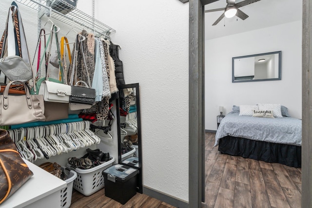 interior space with ceiling fan and wood finished floors