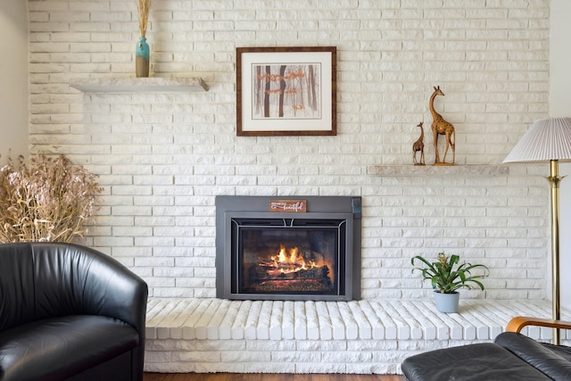 interior space with a brick fireplace