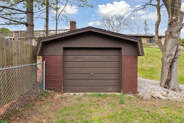 garage with fence