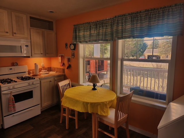 dining room with dark wood-style flooring