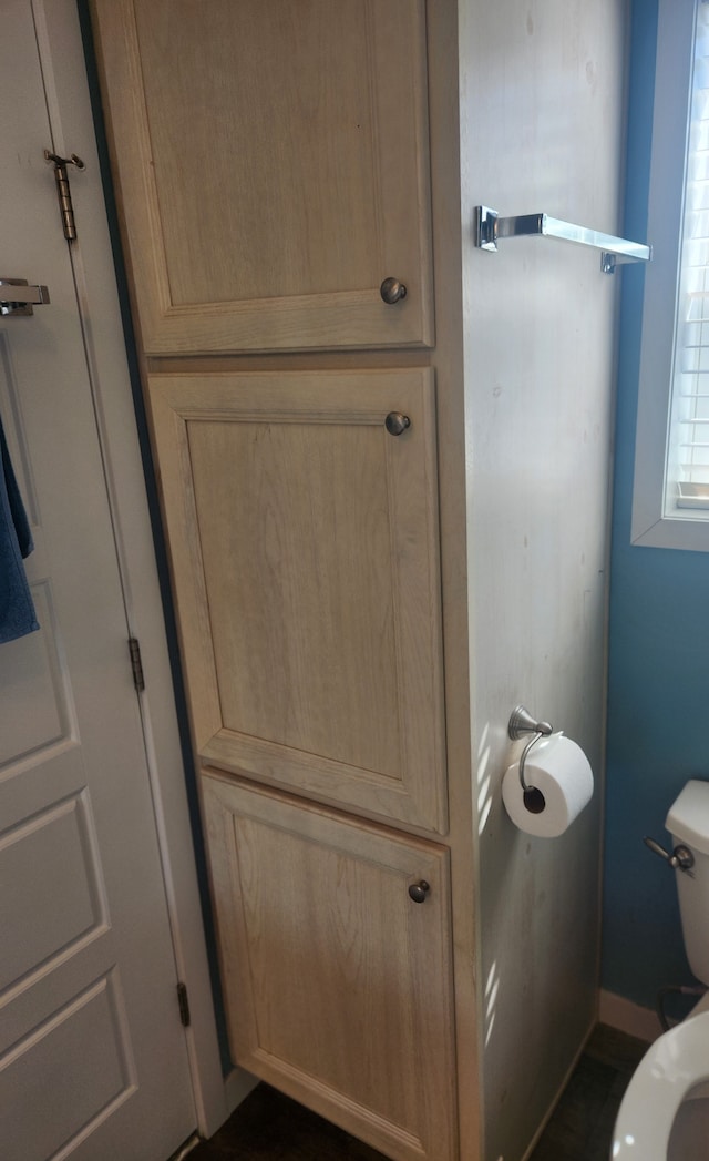 bathroom featuring toilet