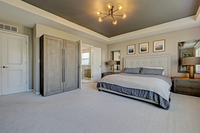 bedroom with visible vents, carpet floors, baseboards, a raised ceiling, and an inviting chandelier