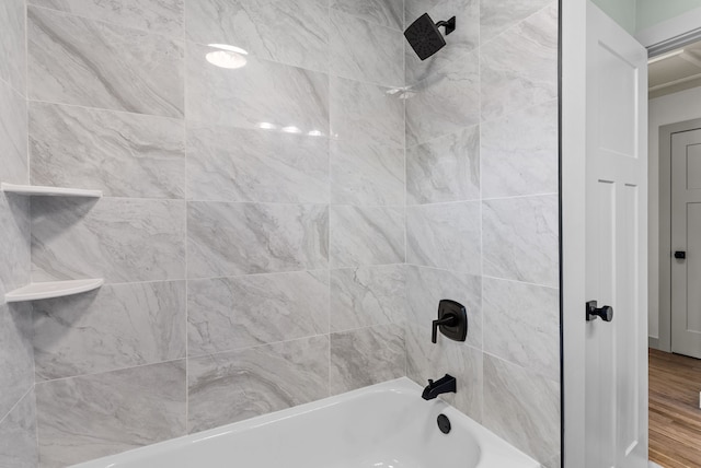 5857 Berkley Dr, Waterford, MI 48327 - full bathroom featuring shower / bathtub combination and wood finished floors