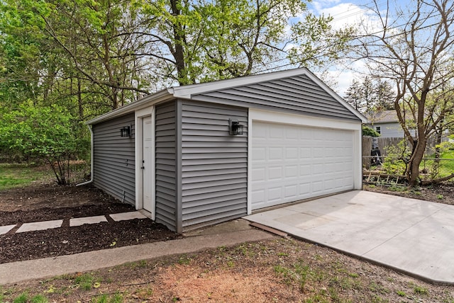 5857 Berkley Dr, Waterford, MI 48327 - detached garage featuring fence